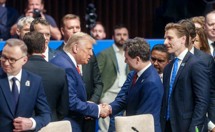 ---------Expert-n-securitate-despre-fotografia-viral-cu-Trump-i-Nicuor-Dan-Nu-romnul-s-a-bgat-n-poz-cu-americanul-ci-invers