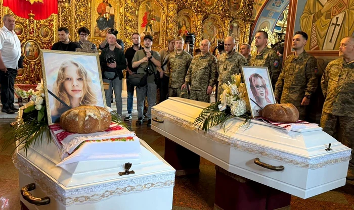 Foto----------Kievul-le-a-plns-pe-surorile-ucise-de-o-rachet-rus-care-a-intit-blocul-n-care-locuiau-Tatl-lor-a-murit-pe-front-acum-3-ani