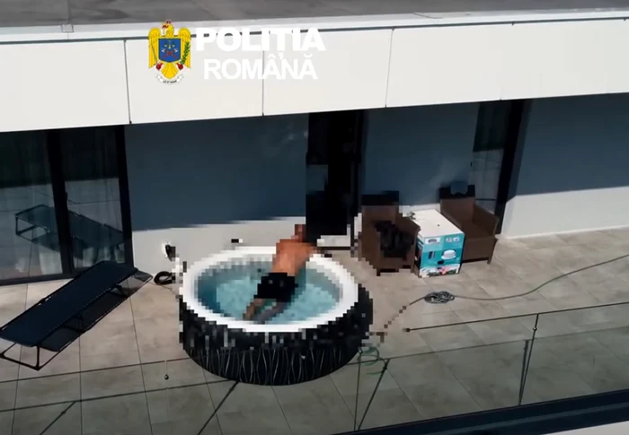 Un bărbat urmărit internațional pentru trafic de droguri, prins cu ajutorul unei drone la piscina unui penthouse în Bistrița