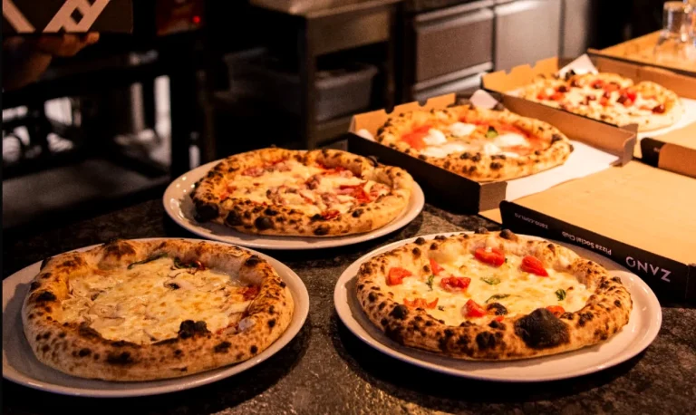 Un tânăr din Polonia acuzat că a comandat sute de pizza și alte mese false, reținut de autorități