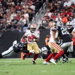 Doi bărbați arestați în SUA după ce unul s-a dat drept jucător NFL și a înșelat zeci de femei cu 1,3 milioane de dolari